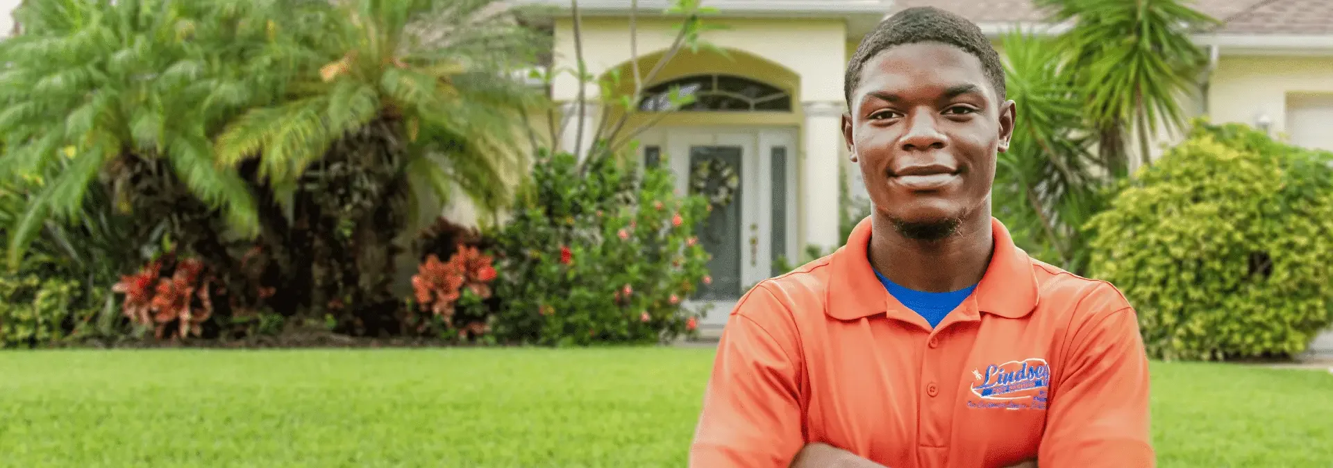 a technician standing in front of a jacksonville beach florida home