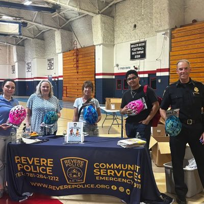 revere police with bike helmets