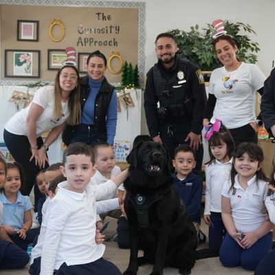 group picture of reading to kids