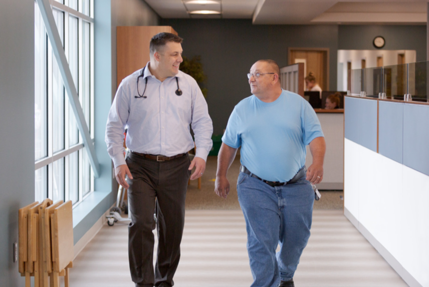 Dr. Brian Haney with Bob Balling, lung cancer patient, at our Topsham office