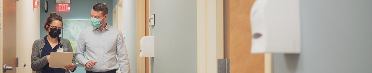 Doctor and nurse consulting