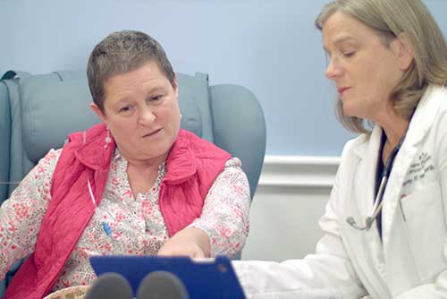 nurse with cancer patient
