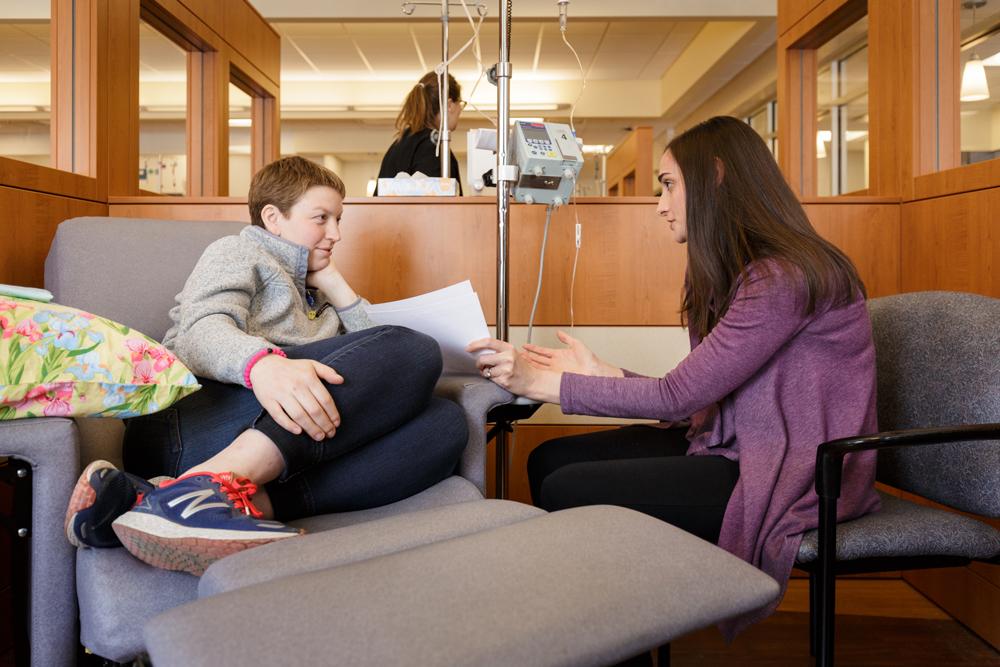 Sarah speaking with Amanda E. Magnoli, ANP-BC, AOCNP