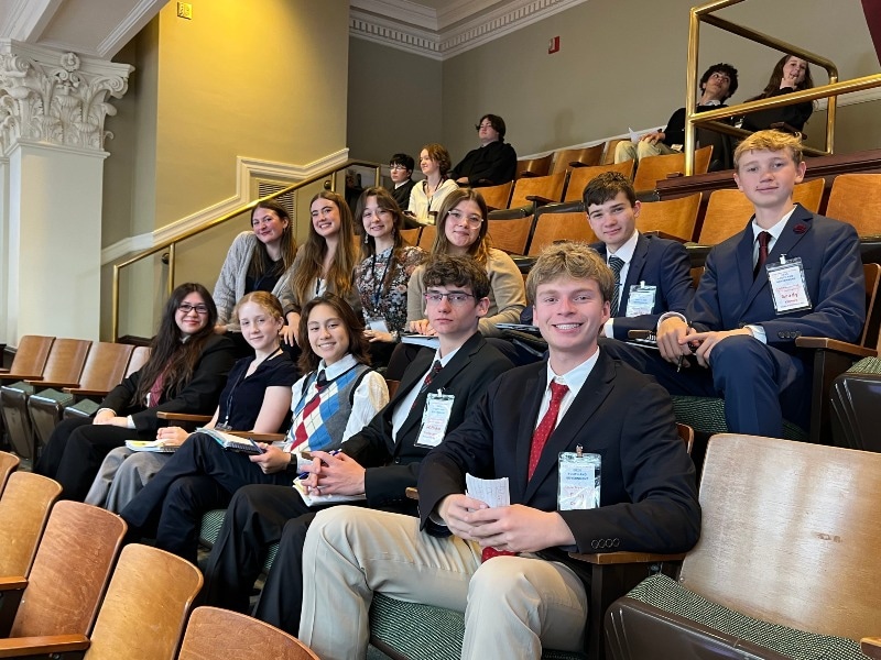 students sitting in chairs