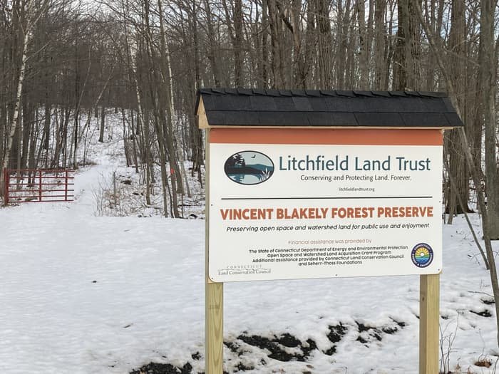 Preserve sign and trail entrance in winter (Credit: Dean Birdsall)