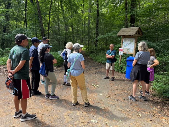 a group of walkers at the Dividend Pond Trails trailhead (Credit: Alan Baglia)