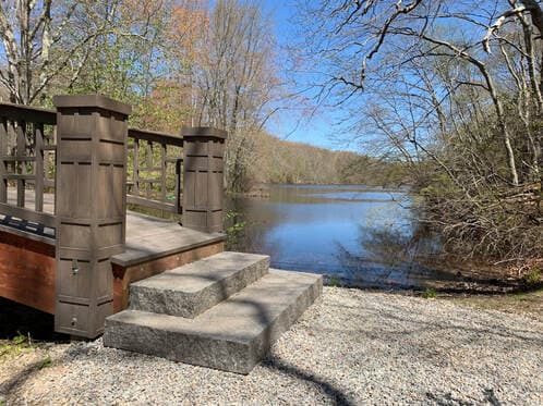 bridge over Clark Pond on a sunny fall day