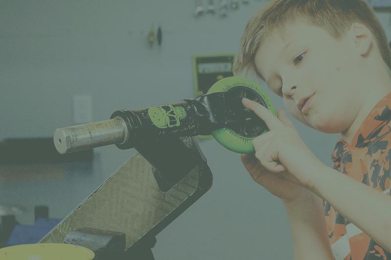 Kid Working on Scooter