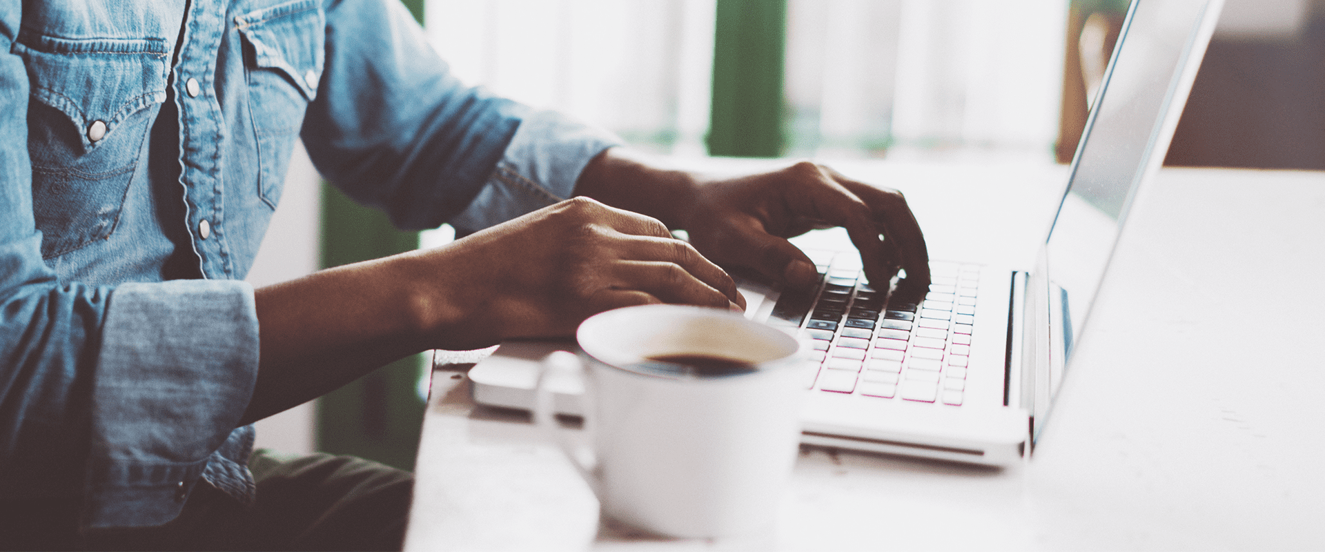 a person writing a blog on a laptop in jupiter florida