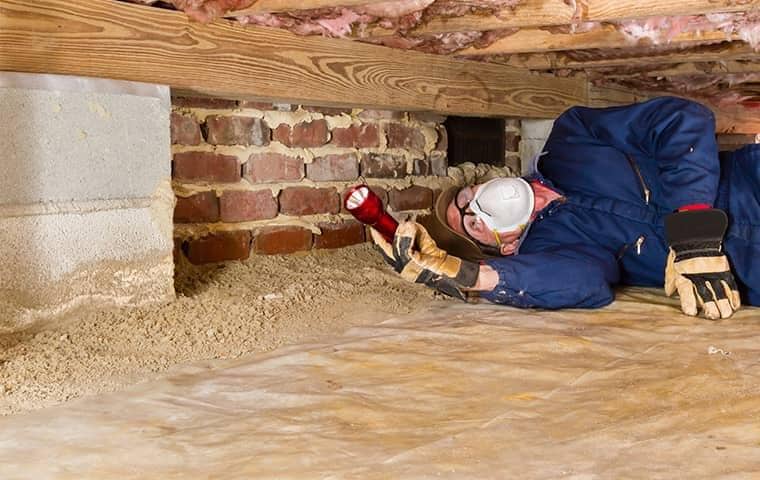 technician inspecting a south florida home