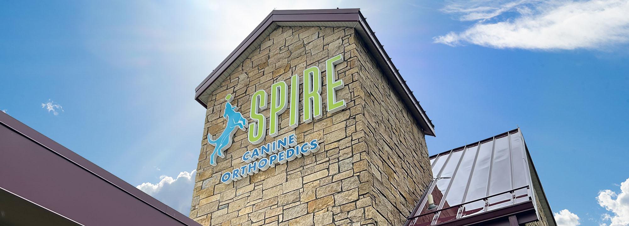 Spire building with logo