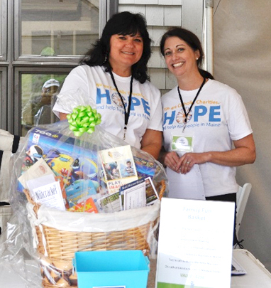 Catholic Charities' volunteers help out at a fund-raising event in Maine. Enrich your own life while bringing hope to someone else!