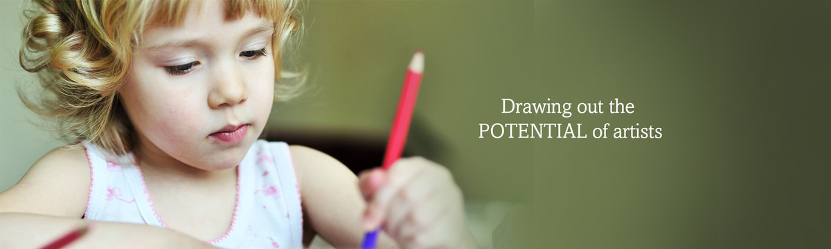 "A young girl draws with a color pencil. We're committied to providing compassionate, comprehensive child care that draws the full potential from children aged six weeks to seven years.