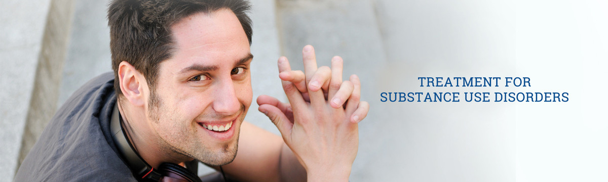 A young man smiles. We provide treatment for substance abuse disorders, offering hope to those struggling with addiction.
