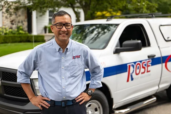 rose technician next to truck