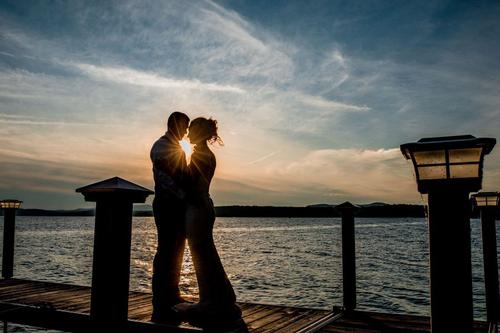 Bride & groom evening lake view