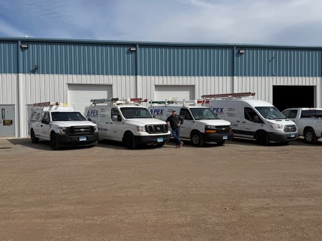 Five white trucks
