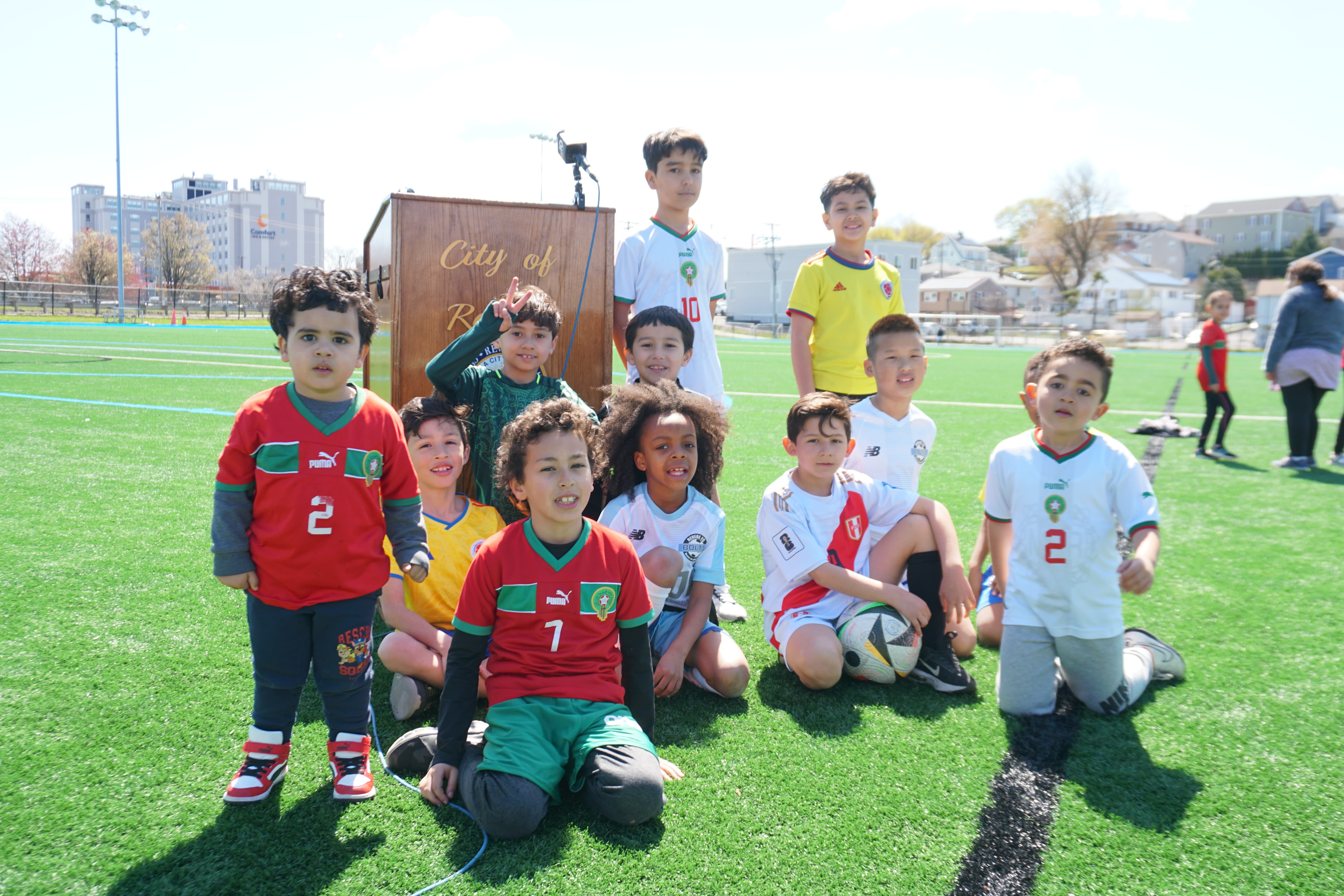 Children in soccer uniforms