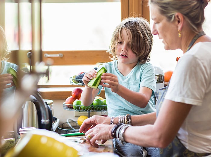 mother and son in roach-free kitchen