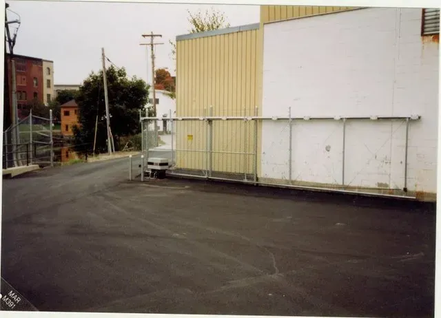 6' Chain Link Plus 1' Barb Wire and Cantilever Slide Gate with Gate Operator