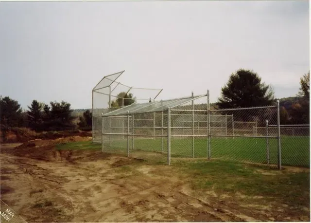 Galvanized Chain Link Back Stop with Overhang and Chain Link Dugout