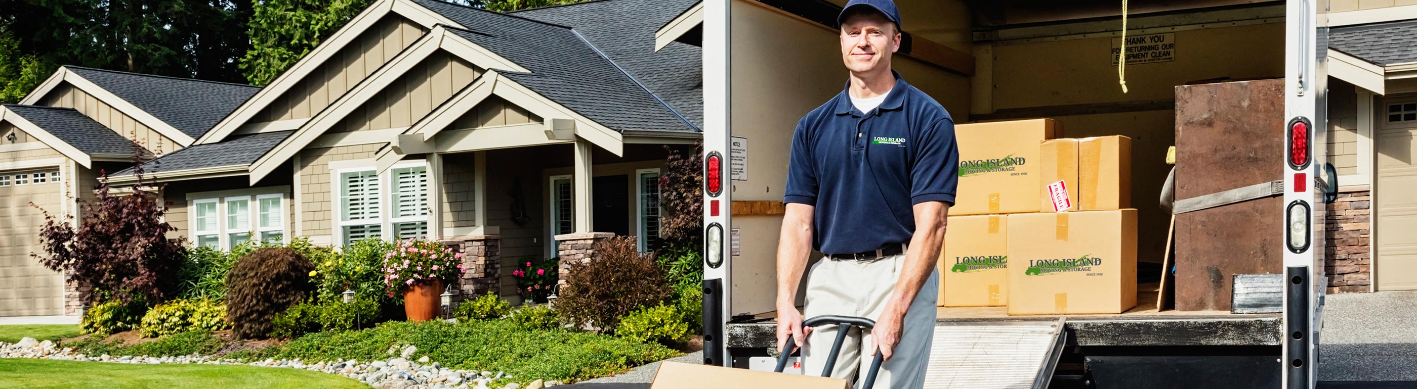 residential movers packing up moving van