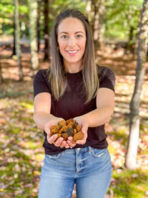 owner rebecca webster taking a break from chaga hunting to fly fish in maine