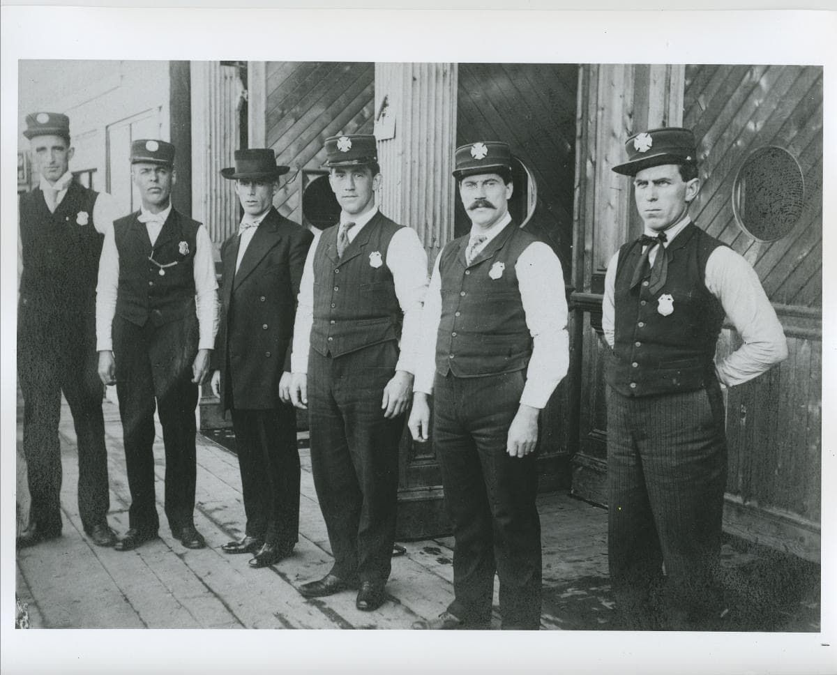 Black and white photo of firefighters