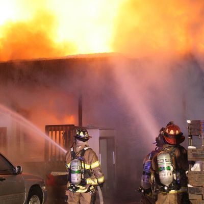 Firefighters putting out fire