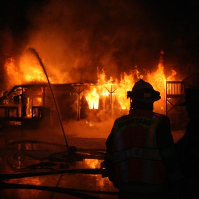 Firefighter in front of fire