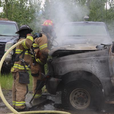 Firefighter with truck