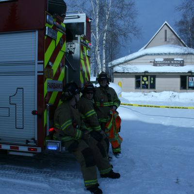 Firefighters in front of school