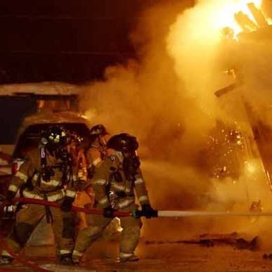 Firefighters fighting fire