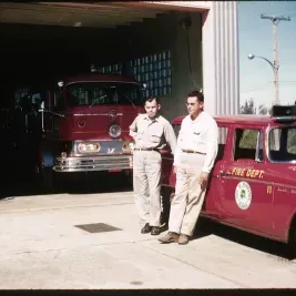 People in front of car