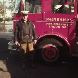 Person in front of fire truck