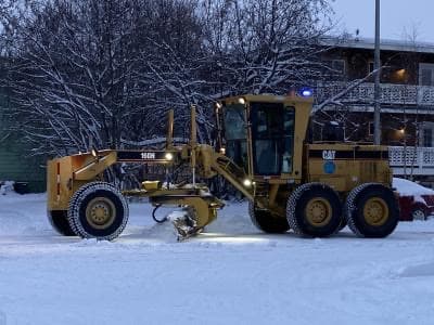 Tractor Plowing Snow