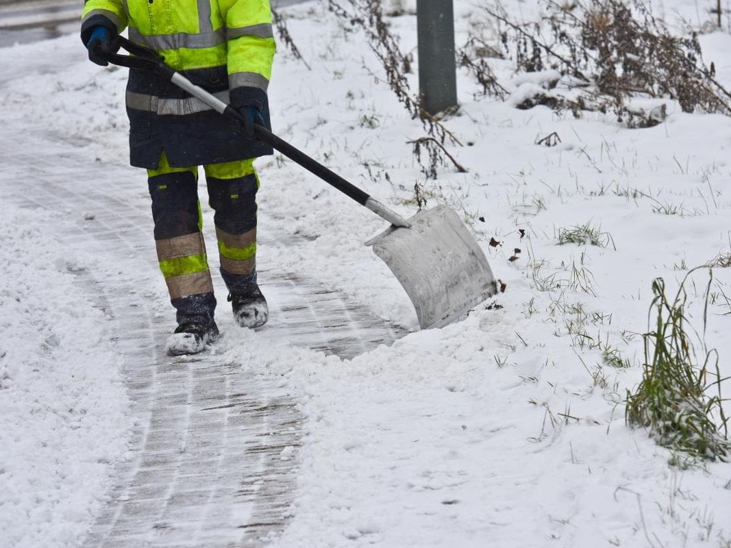 Person shoveling snow