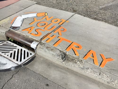 Cigarette storm drain art