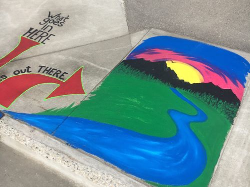 Sunset storm drain art