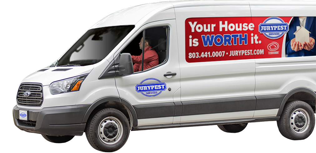 a jury pest services company vehicle in front of a home in north augusta south carolina