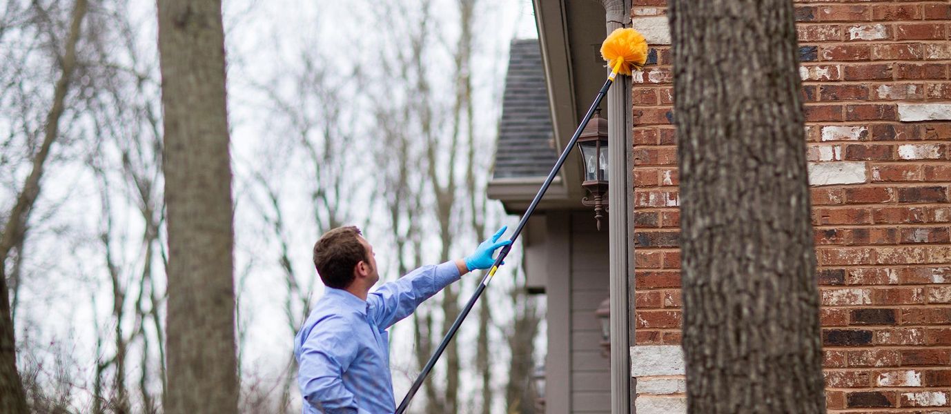 miller pest and termite control specialist treating exterior