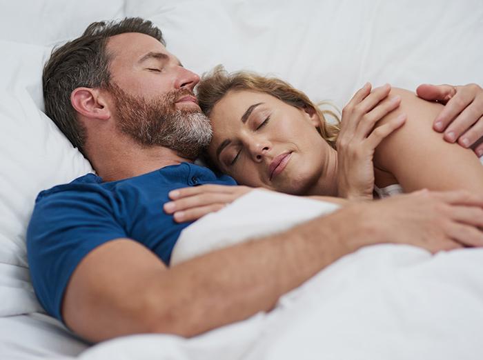 couple sleeping in a home free of bed bugs