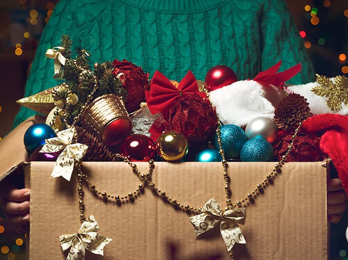 cardboard box filled with christmas decorations