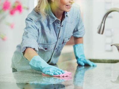 midwest homeowner cleaning kitchen