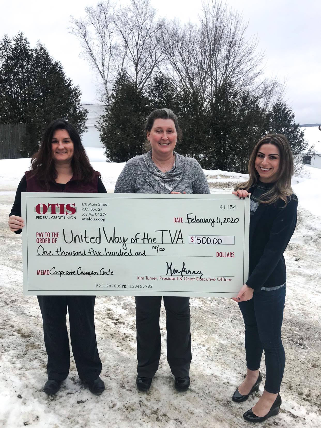 Kendra Baker (FOC) and Nichole Ernest (CRC) celebrate with Sarah Hayes of Otis FCU