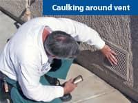 professional pest control tech inspecting a tucson AZ home