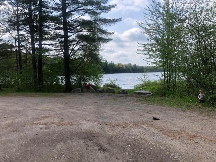 Parking lot with pond view (Credit: Jakobp)