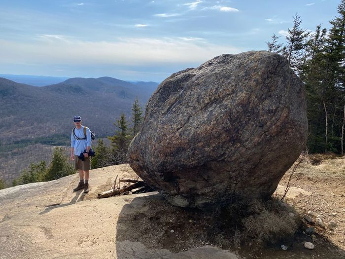 Boulder at the summit of azure mountain. (Credit: Ivan stevenson/ Angela anchor)