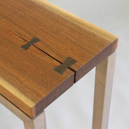 contemporary display table in Walnut.