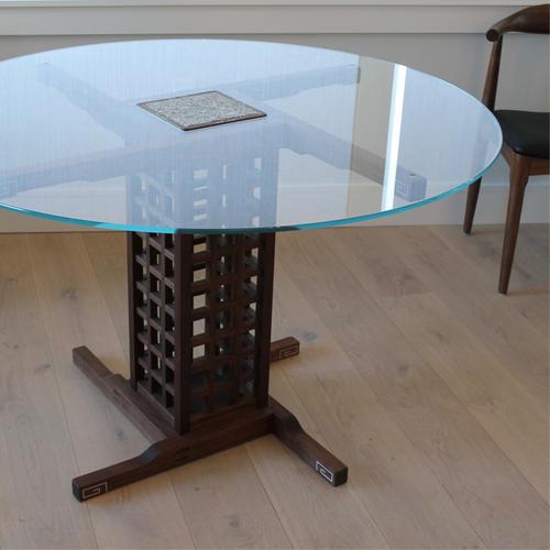 Round glass top dining table.